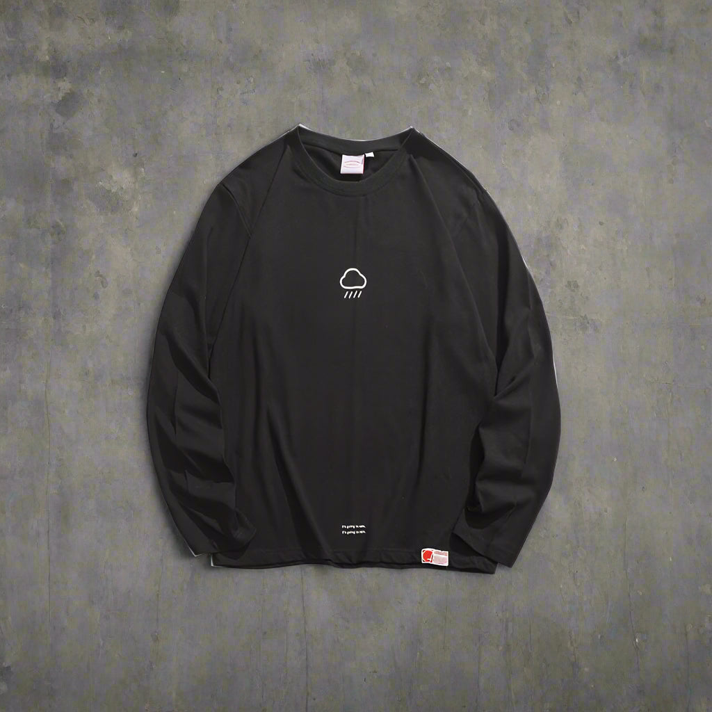 Black long-sleeve shirt with a small logo on a white background