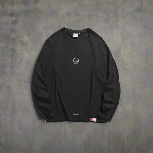 Black long-sleeve shirt with a small logo on a white background